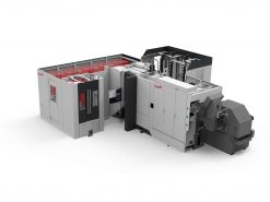 Industriell Starrag-Heckert T-serien tryckpressmaskin på vit bakgrund.